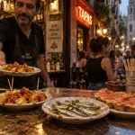tapas barcelone blog : patatas bravas et boquerones dans un bar de quartier à Barcelone